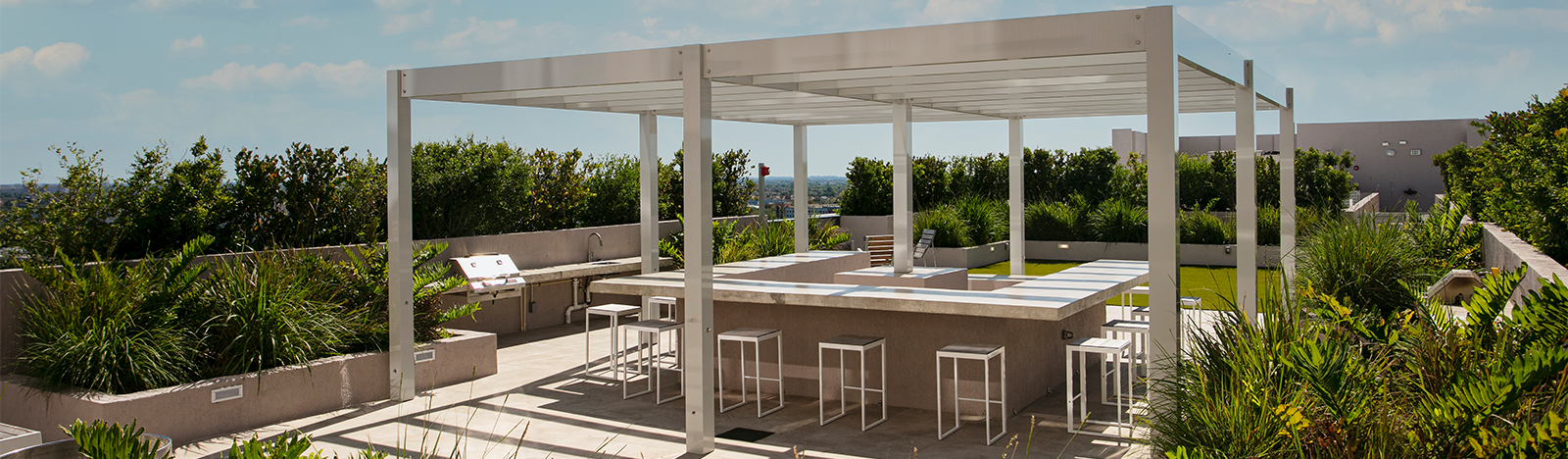 Outdoor lounge featuring grilling stations